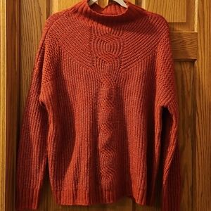 Red oversized cable knit sweater